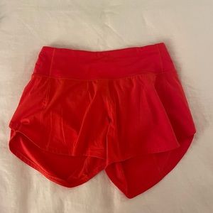 Red lululemon running shorts
